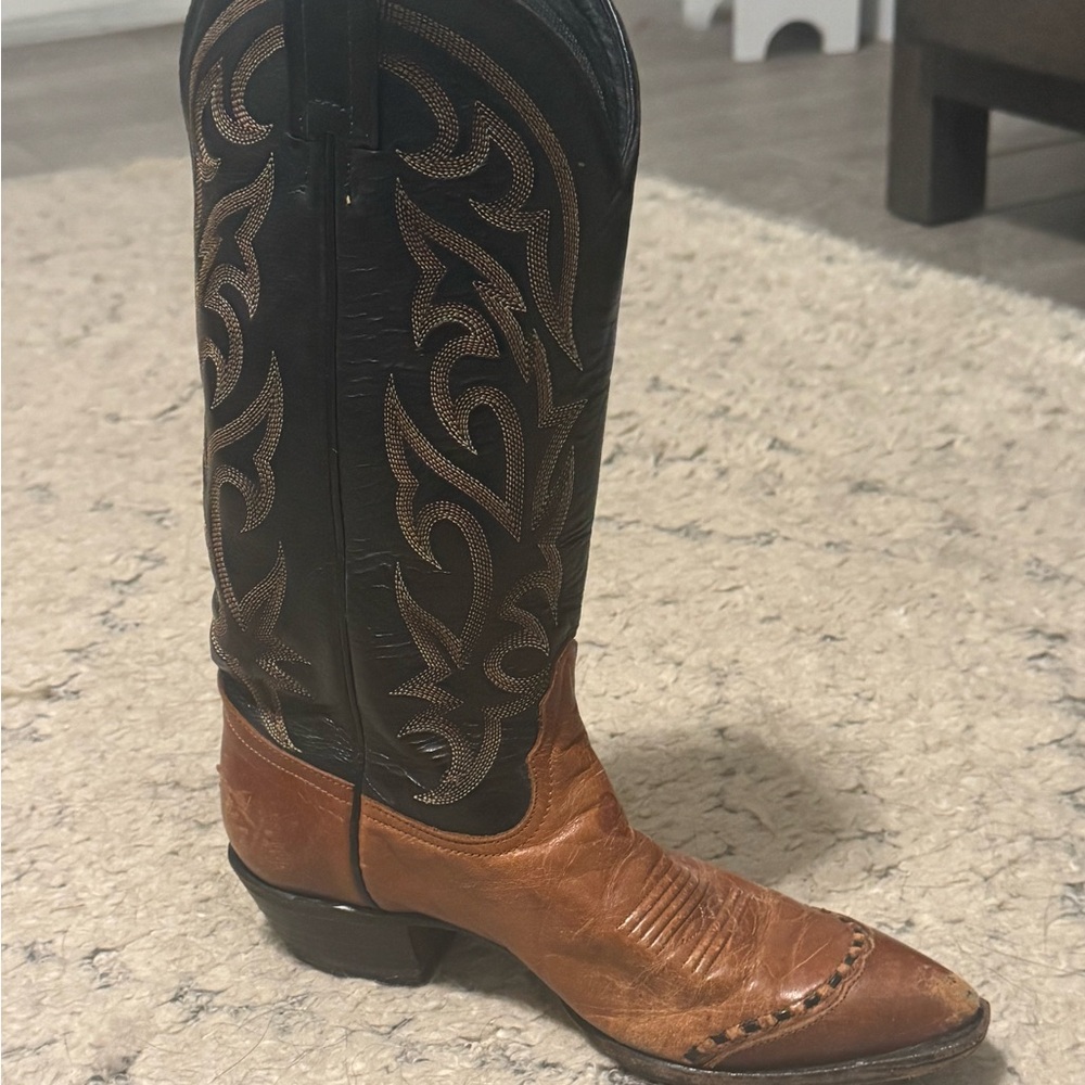 Woman’s Black and Brown authentic Western Boots.